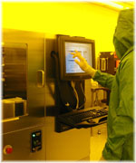 Researcher inside one of the Canadian Photonics Fabrication Centre facilities