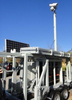 The spectrometer, video camera, weather station, a telescope, a processing/controlling unit and a communications unit comprise the Forest Fire Finder.