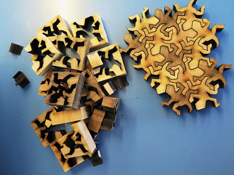 The pattern pieces were separated from their square substrates and then assembled like a jigsaw puzzle