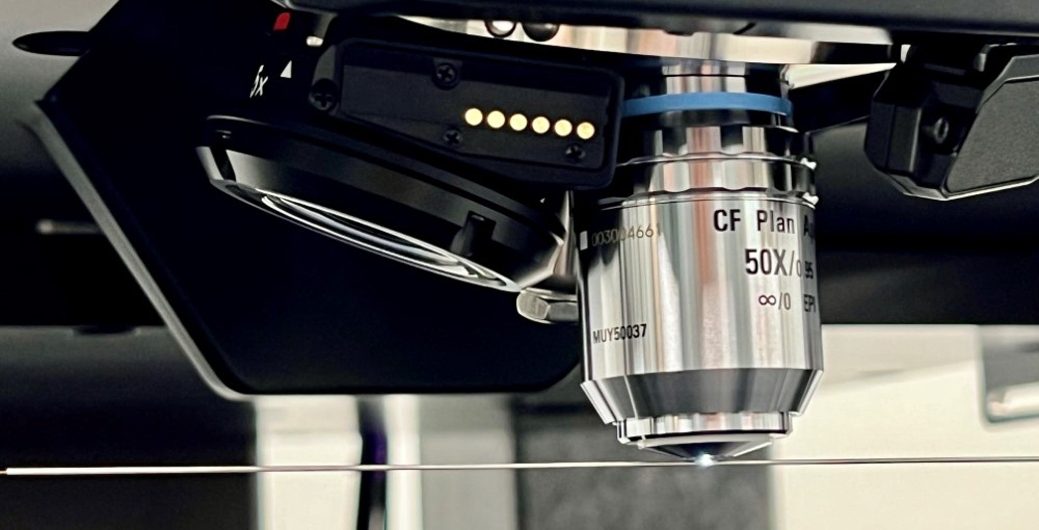 The image shows a 3D laser microscope measuring a cut in a laser-cut Hypotube. The data set generated maps a complete 3D surface.