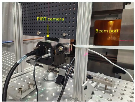 Camera system positioned in beam line. Laser beams are part of NSRL alignment system (Photo courtesy of NASA)