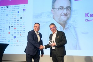 Basil Garabet, president of EPIC, delivers the EPIC Lifetime Achievement to Kestutis Jasiunas, CEO of EKSPA, for his leadership in the Laser Industry