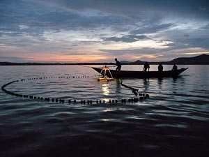 Omena fishermen in Kenya with Osram Energy Hub solar lighting Omena fishermen in Kenya with Osram Energy Hub solar lighting