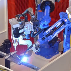In electrically noisy vision-based robotics applications, a computer may need to be located at some distance from a camera to eliminate any interference issues Image courtesy Yaskawa Motoman Robotics In electrically noisy vision-based robotics applications, a computer may need to be located at some distance from a camera to eliminate any interference issues Image courtesy Yaskawa Motoman Robotics