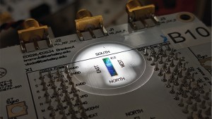 A packaged circuit board containing the chip placed under microscope in probe station during an experiment The first-of-its-kind silicon chip combines both the quantum light-generating components photonics with classical electronic control circuitsall pac