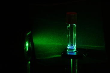 A green lower-energy laser light goes through silicon quantum dots, which the silicon quantum dots re-emit, or upconvert, into a higher-energy blue light Lorenzo MangoliniMing Lee TangUCR A green lower-energy laser light goes through silicon quantum dots, which the silicon quantum dots re-emit, or upconvert, into a higher-energy blue light Lorenzo MangoliniMing Lee TangUCR