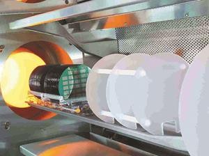 Wafers being transferred into a Silicon furnace Wafers being transferred into a Silicon furnace