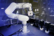 Taking a step toward a future, fully-automated lab, MIT scientists have developed a robotic, reconfigurable laser laboratory Photo Credit Sachin Vaidya, Marin Soljacic