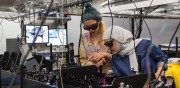 Doctoral students working in The University of Manchesters Photon Science Institute lab